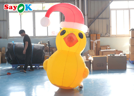 بطة عيد الميلاد قابلة للنفخ باللون الأصفر بطول 2 متر مع زينة فناء القبعة