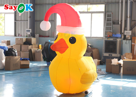 بطة عيد الميلاد قابلة للنفخ باللون الأصفر بطول 2 متر مع زينة فناء القبعة